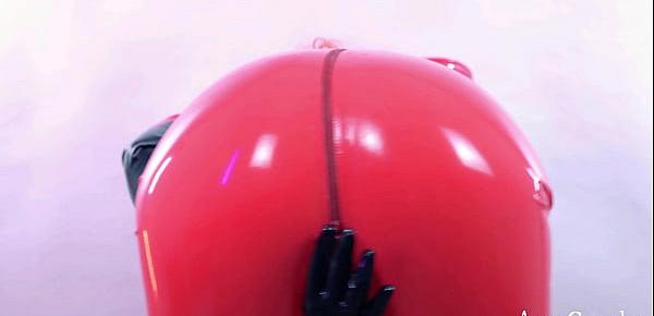  Amazing hot Domme in red latex catsuit teasing close up shiny fetish clothes